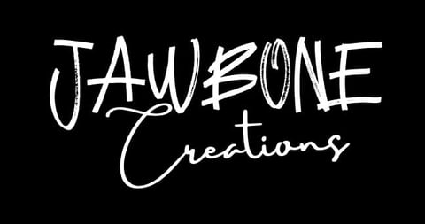 Jawbone Creations logo in white handwritten text on black background